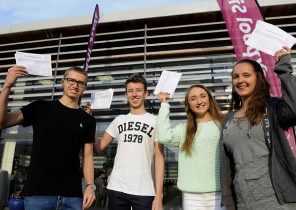A Level Results Day - Blackpool Sixth Form College.  Pictured L-R are Joel Platt, Isaac Hesketh, Fiona Hockey and Amy Hughes.