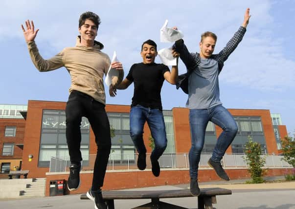 A Level Results Day - St Mary's Catholic College.  Pictured are Luke Lavery, Ghassan Al-Idari and Jan Mieszczak.