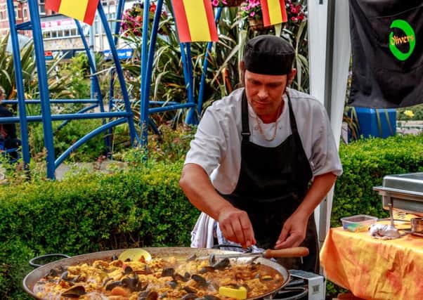 Oliver Sinclair of Oliver's St Annes prerpares a paella at the St Annes Food Fayre. Picture courtesy thefotographr.co.uk