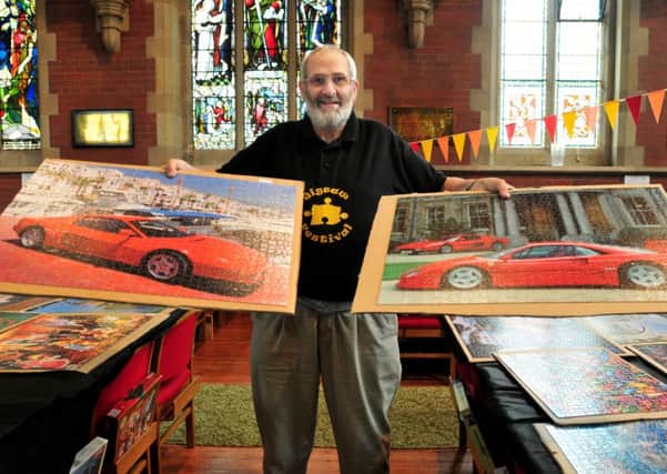 Organiser Matthew Willey with car puzzles at the St Annes Jigsaw Festival