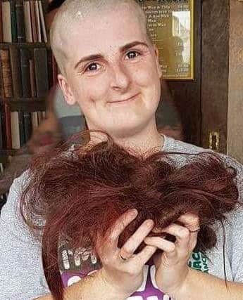 Hair today, gone tomorrow.....Hayley Roles, of Fleetwood, after being shaved.
