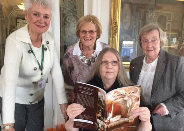 Fylde Council leader Sue Fazackerley, Margaret Race of the Friends of the LSA Art Collection, Jacqueline Arundel, Project Manager and Jo Derbyshire, chairwoman of the Lytham St Annes Decorative and Fine Arts Society admire the brochure resulting from the Tagging The Treasures project