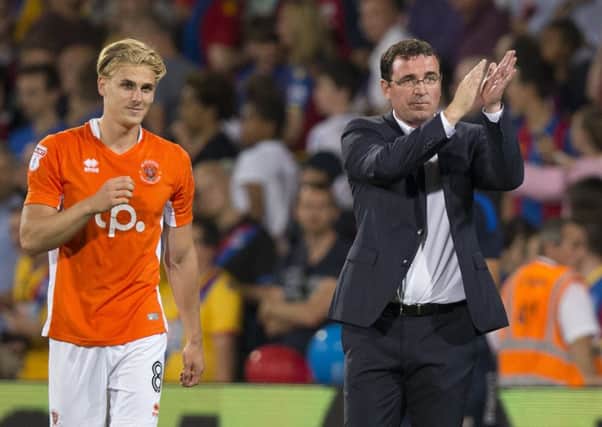 Gary Bowyer applauds the fans with Brad Potts  after the EFL Cup defeat at Crystal Palace