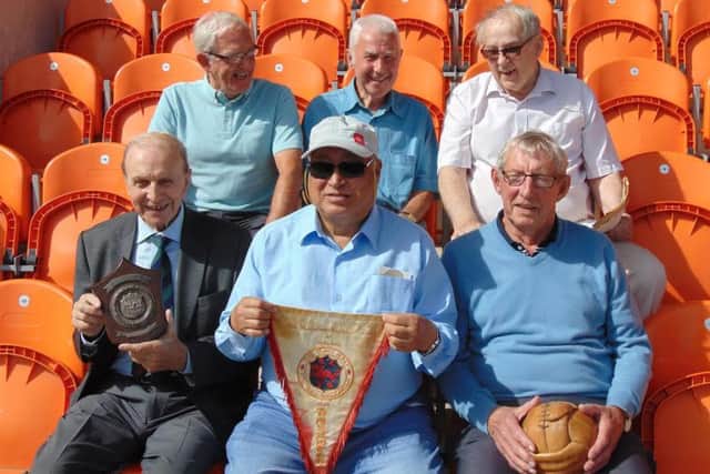Former Blackpool FC player Cheung Chi Doy, front centre, reunites with his former team mates, from left, Graham Oates, Tommy Thompson, Barrie Martin, Jimmy Armfield and Glyn James.