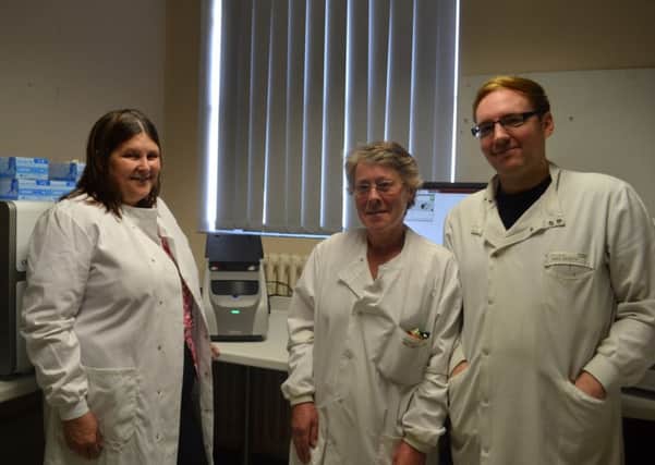 Dr Ruth Palmer, Kathryn Chandler and Shaun Beckwith with the Biofire Film Array, which has been bought thanks to donations to Blue Skies Hospitals Fund.