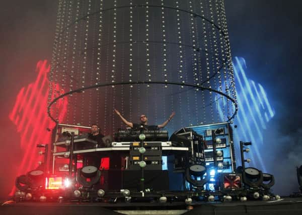 The Chemical Brothers, Ed Simons (left) and Tom Rowlands, performing on the Main Stage at the Wireless festival in Hyde Park, in central London.