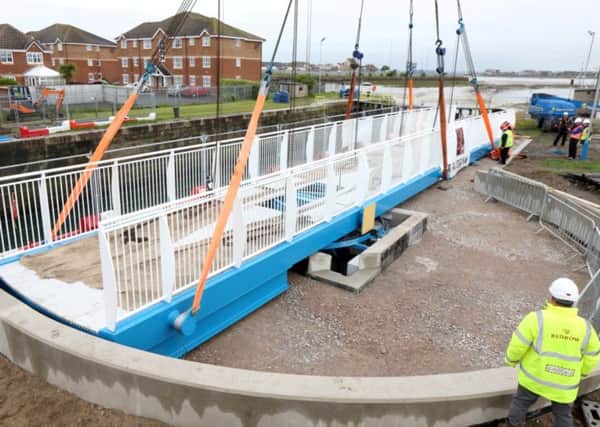 The swing bridge is manouvred into place at Fleetwood.