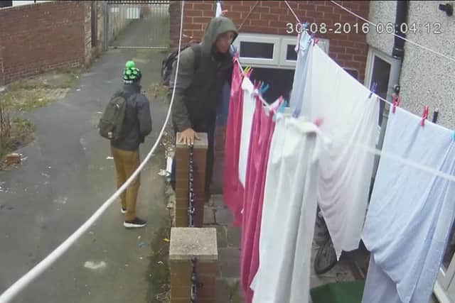 The burglars scaled a wall to get into the yard and take a Â£1,500 electric bike