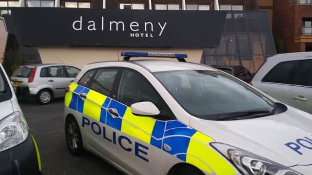 Police outside the Dalmeny Hotel where a three year old girl got into difficulties in the pool and later died.