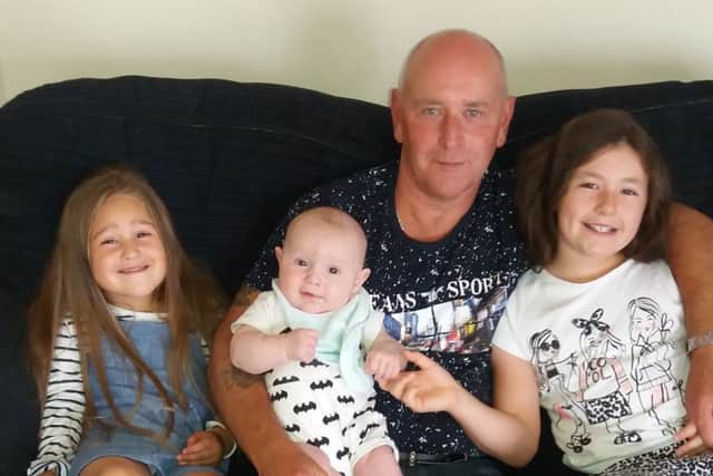 Phi Marlow, who donated a kidney to his son Jamie with his miracle grandson Spencer who has been born since the transplant and two of his grand-daughters