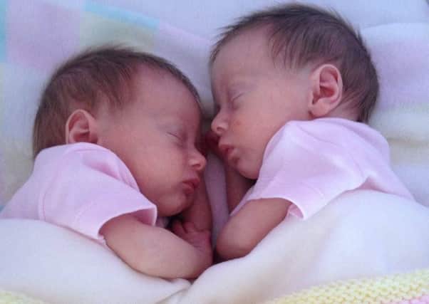 "Momo" twins Millie and Mollie are home at last - despite doctors initial fears that they would die just 14 weeks into mum Selina Curtis' pregnancy