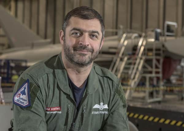 Chief fast jet test pilot Steve Formoso in front of a Eurofighter