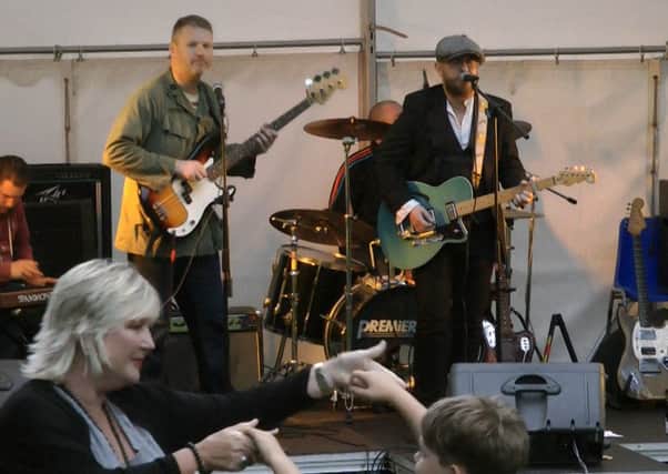 Cornelius Crane performing at the St Annes Music and Arts Festival in Ashton Gardens