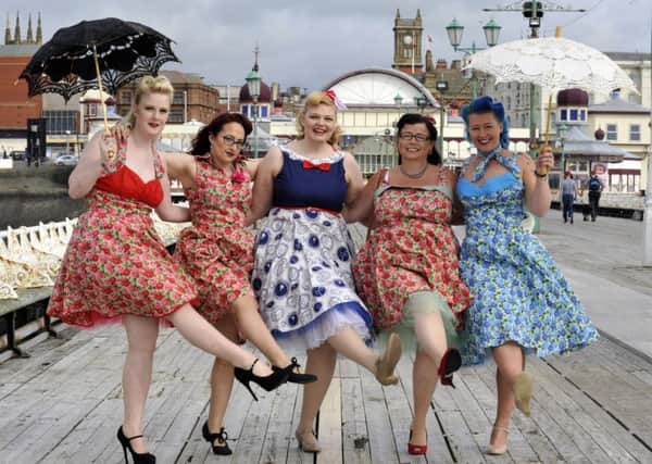 from left, Alii India, Pippa Fitt, Ingrid Burton-Mulhall, Anne Hindle and Natale Reede along Blackpool North Pier for the Vintage Fashion Show