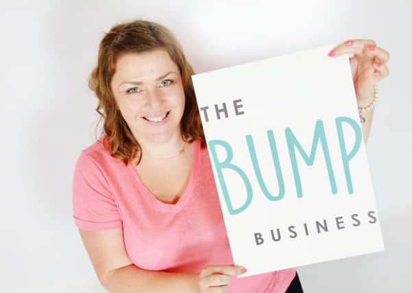 Caroline Thompson, of Bispham, with her sign for the Bump Business 
Pic courtesy Jo's Photos