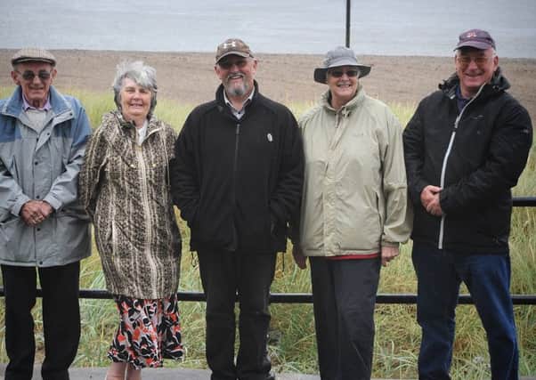 Fleetwood Civic Society are beginning a campaign to rescue the Wyre Light lighthouse in Morecambe Bay, as it is falling into disrepair.
Pictured L-R are: Ken and Margaret Daniels, William Hargreaves, Yvonne and Iain Johnstone (NOTE TO RICHARD- the Light was utterly obscured by rain and mist!).  PIC BY ROB LOCK
19-8-2016