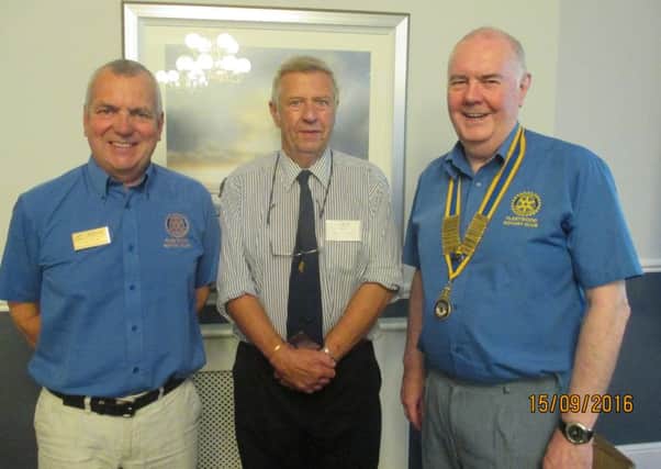 Fleetwood Rotarians  Dr  Mike  Page (left) and  Maurice Dowsing with  Duncan Hamlett (centre) from the charity Mercy  Ships.
