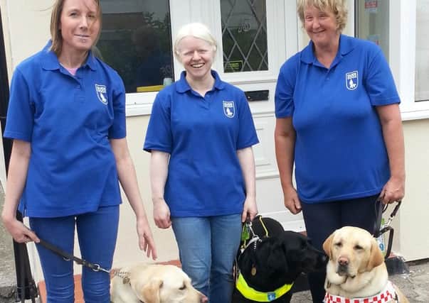 Michelle with guide dog Millie, Lisa with guide dog Nellie and Nicky with guide dog Tillie