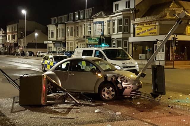 The Beetle flattened a phonebox before smashing into a traffic light, leaving it hanging down