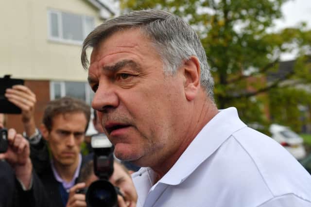 Sam Allardyce outside his home in Bolton.