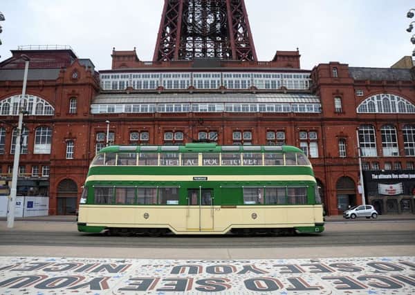 Blackpool's heritage trams made their first appearance of the year over the Easter weekend.
One of the trams passes the Comedy Carpet.  PIC BY ROB LOCK
26-3-2016
