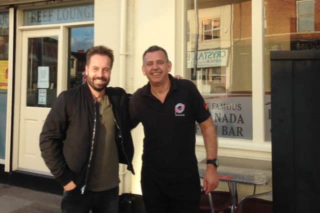 Alfie Boe (left) with Steve Lynton at Granadas fish bar in Fleetwood