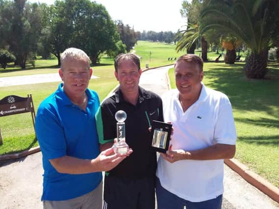 Gazette Matchplay 2016 winner Justin Hatcher (centre) with sponsors Ian Wharmby (right, of Blacktax) and Phil Barker of the Airport Transfer Group