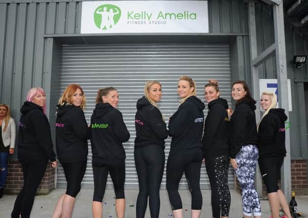 Kelly McNab officially opened her gym Kelly Amelia Fitness on Brinwell Road in Marton.
Kelly (centre) with her instructors.  PIC BY ROB LOCK
24-9-2016