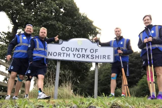 Dan Farnworth, paramedic, Rich Morton, paramedic lecturer, Gill Despard and senior paramedic, Phil Baggaley set off on their coast to coast trek to raise money for the Blue Light Walk charity.