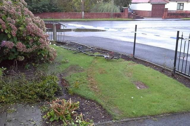 The damaged garden fence after a car smashed into a homes front garden in Anchorsholme