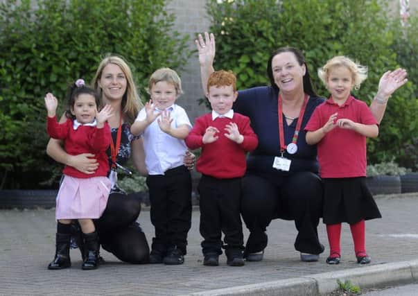 Unity's nursery has been rated outstanding by Ofsted.  Early years practitioner Vicki Swan and nursery manager Jenny Burgeen with Natalia Langford, Adam Dunn, George Walton and Faith Scroggie.