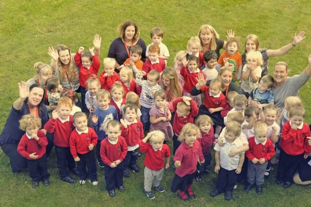 Unity's nursery has been rated outstanding by Ofsted.  Staff and children celebrate.