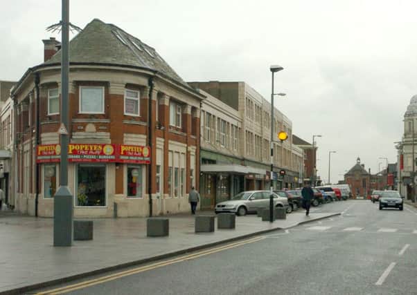 The junction of Church Street with Caunce Street Blackpool, showing Stanley Buildings.