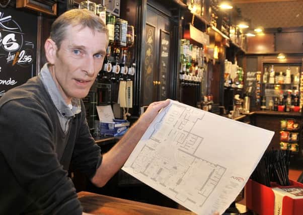 Kieran Clerkin with the plans for The Mount Hotel, Fleetwood