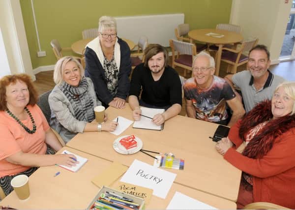 Poetry workshop for National Poetry Day.  Pictured L-R are Anne Ward, Melanie Whitehead, Suzanne Forbes, poet in residence Anthony Briscoe, David Porteous, Marcus Beasley and Angie Buss.