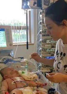 Kerrylee Glass with baby Thomas Williams, who has undergone two major heart operations at just 13 weeks old