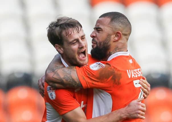 Andy Taylor celebrates his goal with Kyle Vassell