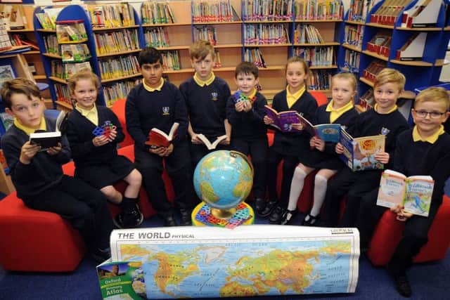 Baines Endowed Primary School in Marton has been awarded a Basic Skills Quality Mark in English and maths, and also a Quality Mark silver award for geography. Pupils in the library working on their numeracy, literacy and geography