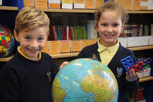 Baines Endowed Primary School in Marton has been awarded a Basic Skills Quality Mark in English and maths, and also a Quality Mark silver award for geography. Pupils in the library working on their numeracy, literacy and geography