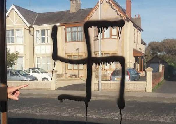 Graffiti on a bus stop outside Ocean Tyres on Lytham Road, South Shore
