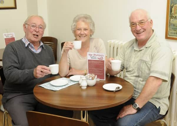 Fleetwood Museum Trust's Keith and Sue Porter with Iain Johnstone.