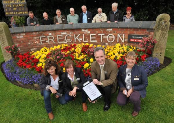 Britain In Bloom judges Geraldine King and Andrew Jackson in Freckleton to judge it for national best small town awards, with Sue Lee, chairman and Christine Graham, secretary