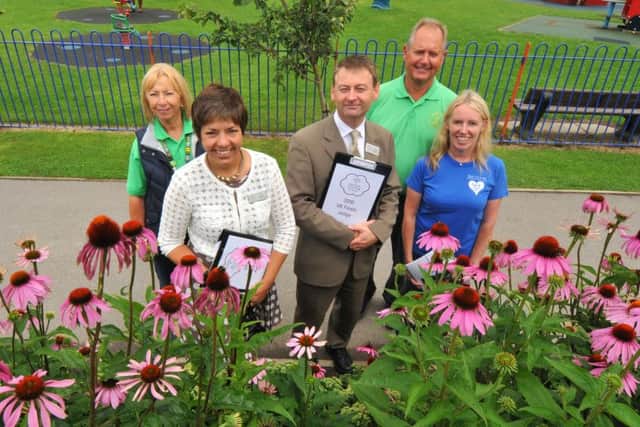 Britain In Bloom Champion of Champions  judges Sue Wood and David Jamieson at Park View 4U in Lytham this summer, with Susan Evans, David Kerr and Julie Norman of Lytham In Bloom