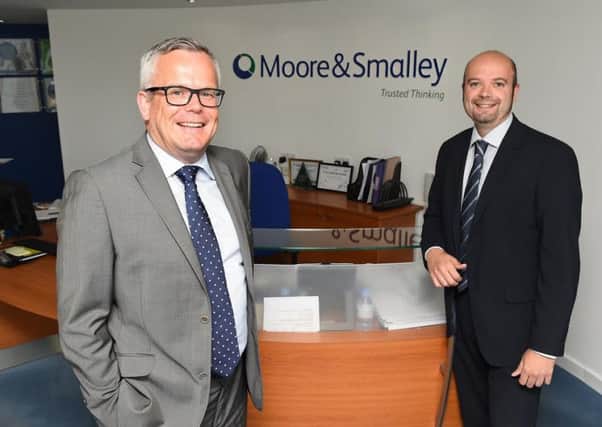 Darren Pilkington, left, with partner Mike Hardaker. Darren has joined Moore and Smalley amid expansion