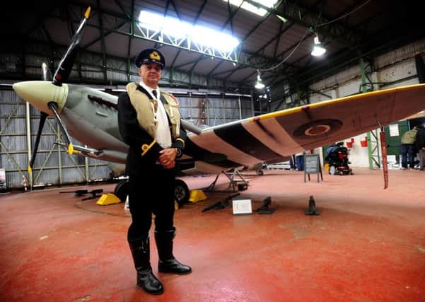 Lytham St Annes Spitfire Museum, Blackpool Airport, held an open day at the weekend. Visitors were treated to talks on aerial combat, history displays plus two Spitfires, a Hurricane and various RAF military vehicles. Volunteer Mark Gaskell with one of the Spitfires. Picture by Paul Heyes, Saturday August 20, 2016.