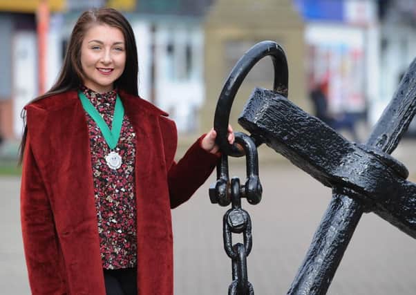 Jessica Basquill, of North Albion Street in Fleetwood, who has become Wyre Youth Mayor.
Jessica next to the commemorative anchor on Fisherman's Walk.  PIC BY ROB LOCK
14-10-2016