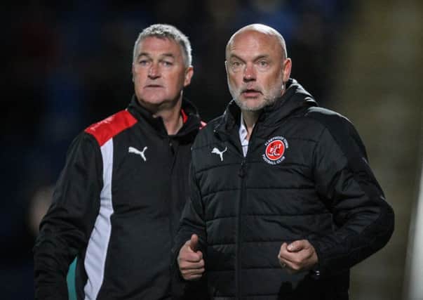 Fleetwood head coach Uwe Rosler and assistant Rob Kelly