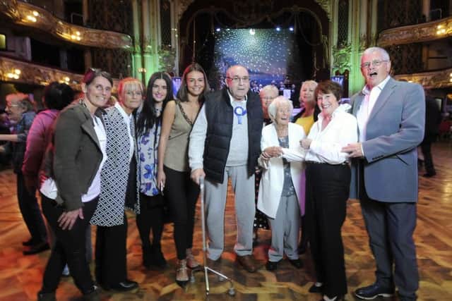 Dancing with Dementia at Blackpool Tower Ballroom.  88-year-old Aldo Chiappe and 102-year-old Jackie Bastable both celebrate their birthday with a dance. They are pictured centre with family.