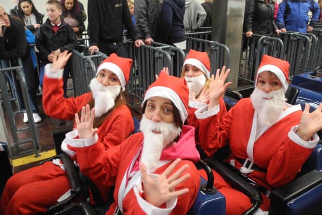 Santas from Trinity Hospice Fundraising brave the Big One