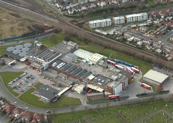 This 2011 aerial shot shows Burton's factory in Devonshire Road, North Shore. At the bottom of the picture the cemetery can be seen.